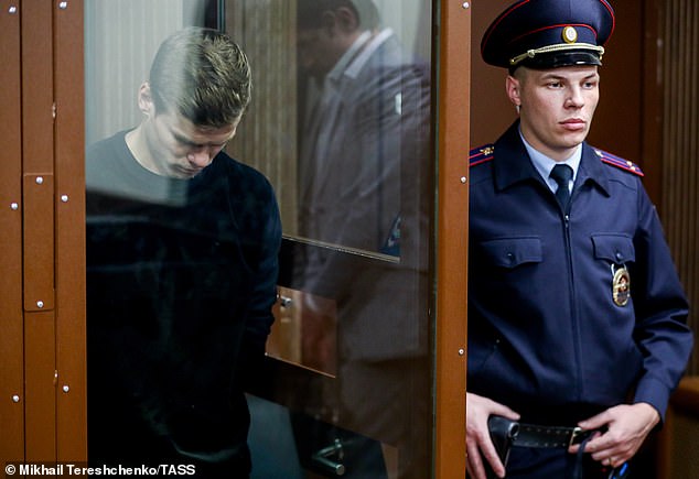 Kokorin hangs his head following his arrest in the Russian capital earlier this week