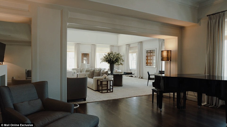 One of the rooms features a glossy black grand piano and a comfortable armchair, so guests can sit back and relax while listening to music being played