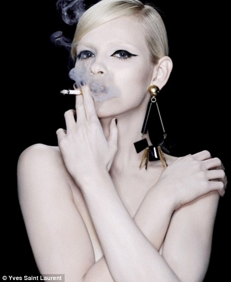 A model that looks uncannily like Kate Moss appears in a promotional image for the cigarettes