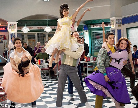 Dancing queen! Selena enjoys a retro jive with her Disney co-stars