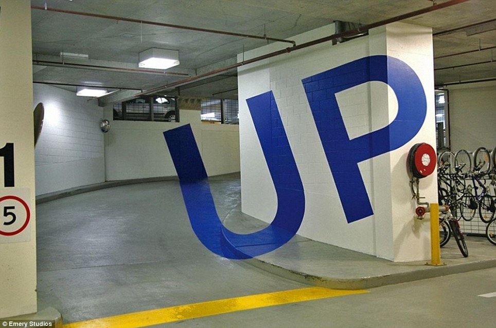 The Eureka Tower Car Park in Melbourne, Australia, features cleverly-painted lettering that jumps out of its surroundings. The buidling was designed  by Axel Peemoeller