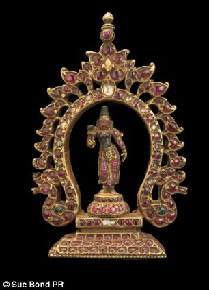 Although only 10 cm tall, this pendant is made from gold, rubies, diamonds and emeralds and would fetch a good price at auction