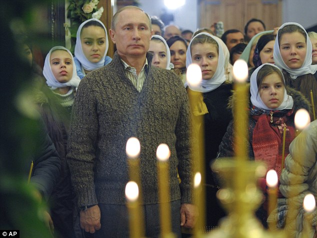 The Russian president, 62, will have the wine he produces stored in acclimatised cellars costing an estimated £750,000 to install. Above, Putin at the Orthodox Christmas service at a cathedral in the village of Otradnoye, Voronezh region, Russia on Wednesday the Julian calendar. The 62-year-old will have the wine he produces stored in acclimatised cellars costing an estimated £750,000 to install