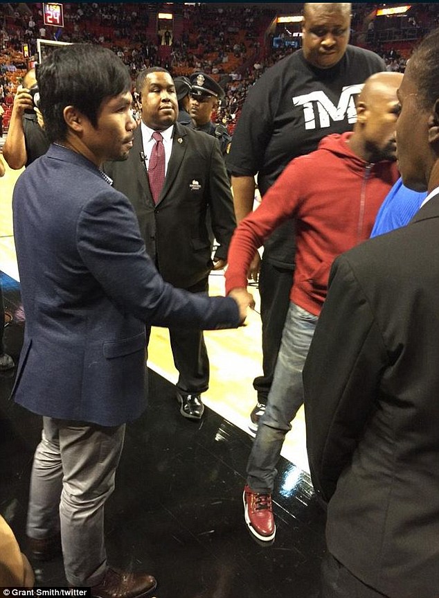 A handshake brought an end to the brief encounter between Pacquiao and Mayweather in Miami