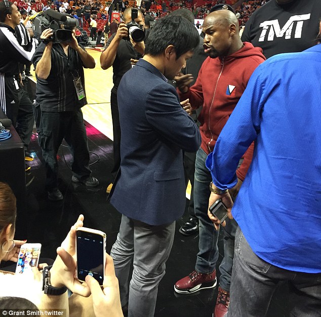 In one image it looked as if Mayweather had most to say and Pacquiao was doing most of the listening