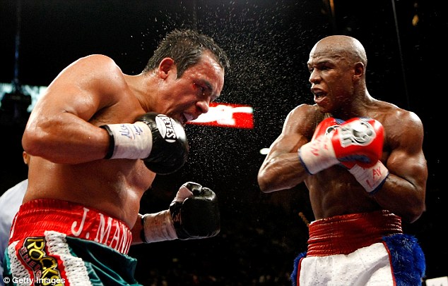 Floyd Mayweather won a unanimous points decision over Juan Manuel Marquez (left) in 2009