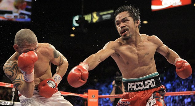 Pacquiao ended 2009 with another high-profile victory, this time over Miguel Cotto