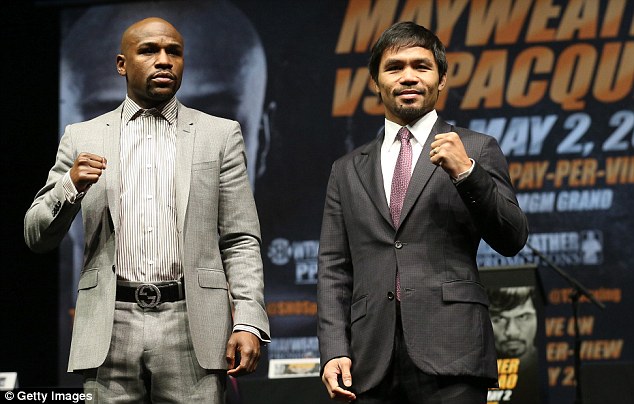 Floyd Mayweather (left) and Manny Pacquiao pose in their only face-to-face meeting before their fight