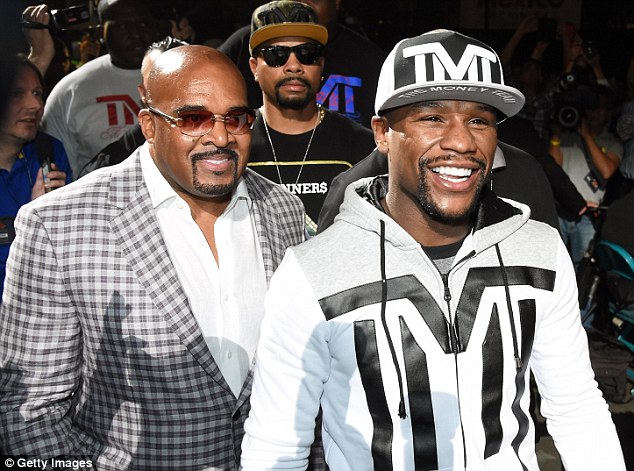 Floyd Mayweather arrives at the MGM Grand with the CEO of Mayweather Promotions Leonard Ellerbe