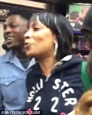 A woman in Brixton argues with Mayweather