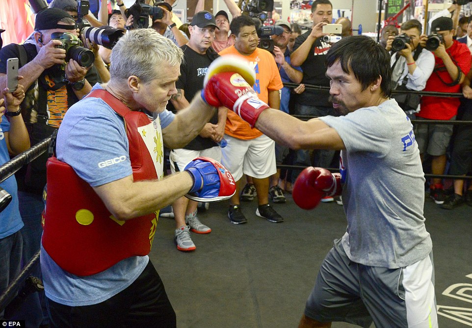 Pacquiao hones his technique at the Wild Card Boxing Club in Los Angeles in the build-up to the big fight with Mayweather