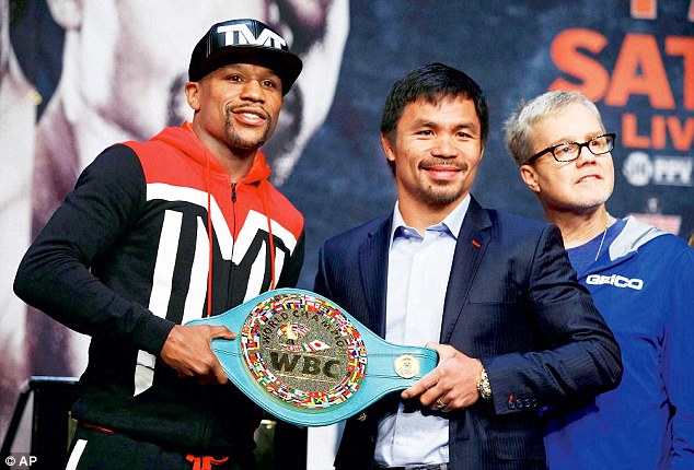 Floyd Mayweather and Manny Pacquiao pose with a WBC belt  ahead of the 