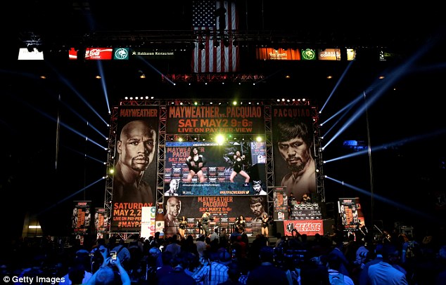 Fans look on before the official weigh-in between Mayweather and Pacquiao at the MGM Grand on Friday