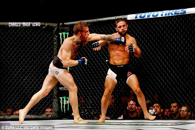 Chad Mendes (right) earned $500,000 dollars despite losing to McGregor as a late replacement last year