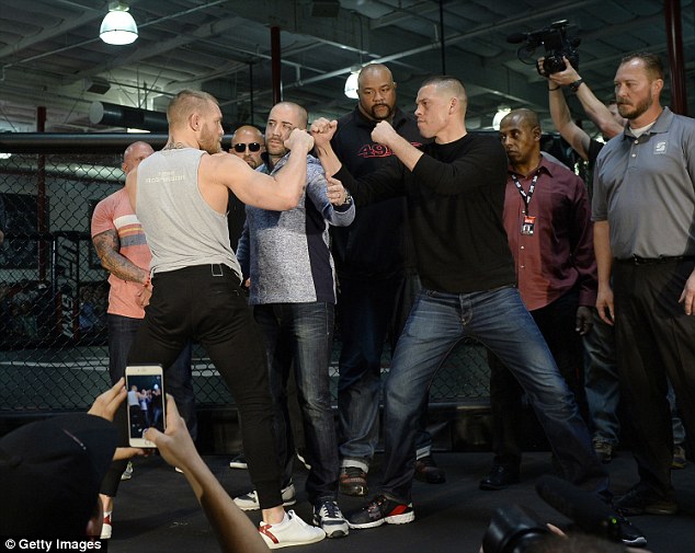 The Irishman (left) will now face Nate Diaz (3rd right) in the Octagon after stepping up a weight class 