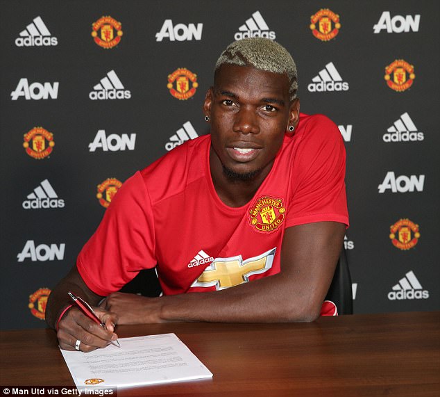 Manchester United midfielder Paul Pogba earns £290,000 per week in his current deal