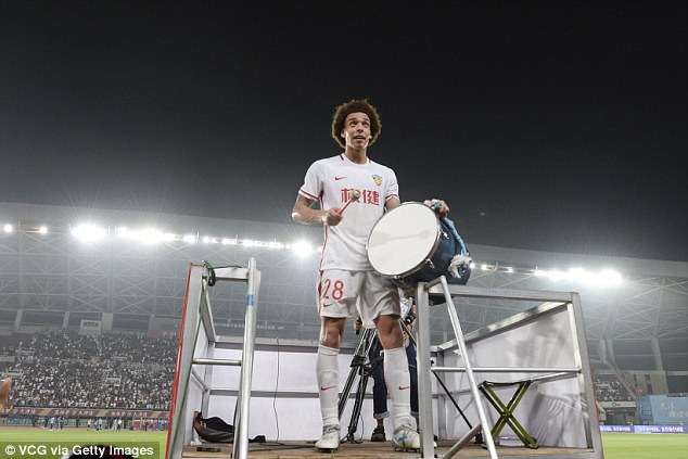 Belgium midfielder Axel Witsel acknowledges the crowd at his unveiling at Tianjin Quanjian