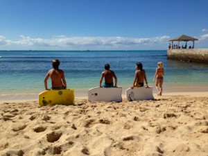 A better life, three kids on boogie boards