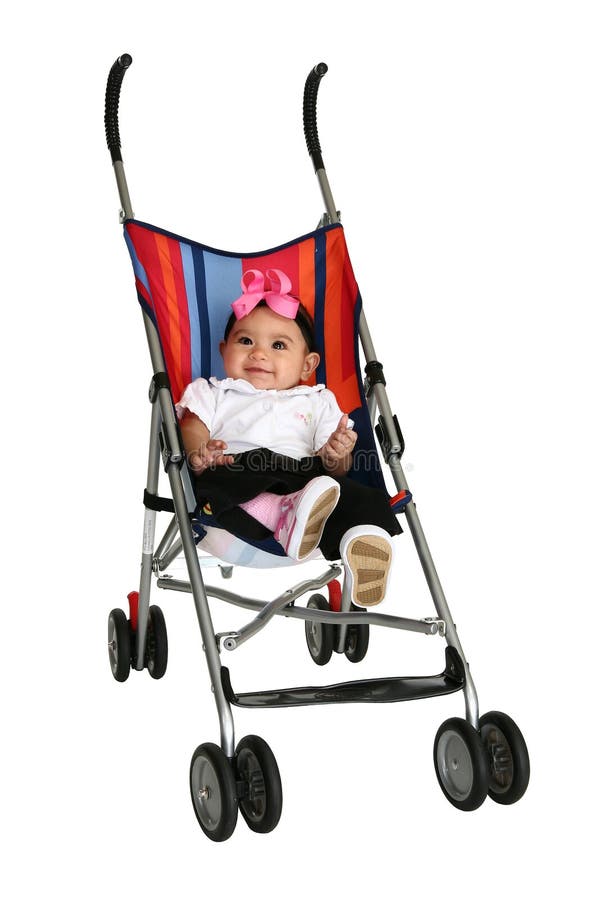 Baby Girl In Stroller. Happy baby girl in stroller over white background. Full body stock photography