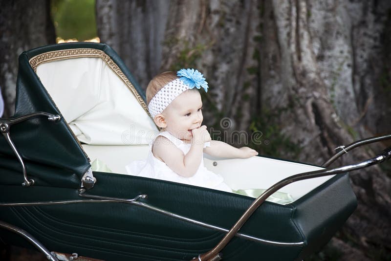 Baby in stroller royalty free stock images