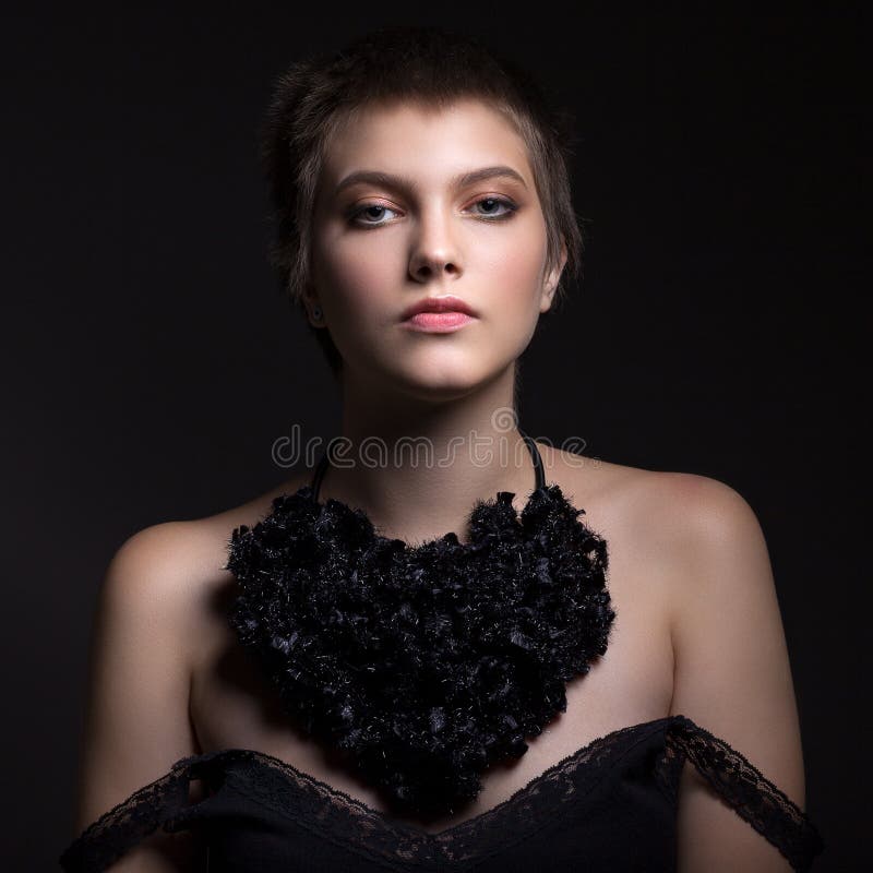 Beautiful portrait of a teenager girl. With beautiful makeup and chic decoration stock photography