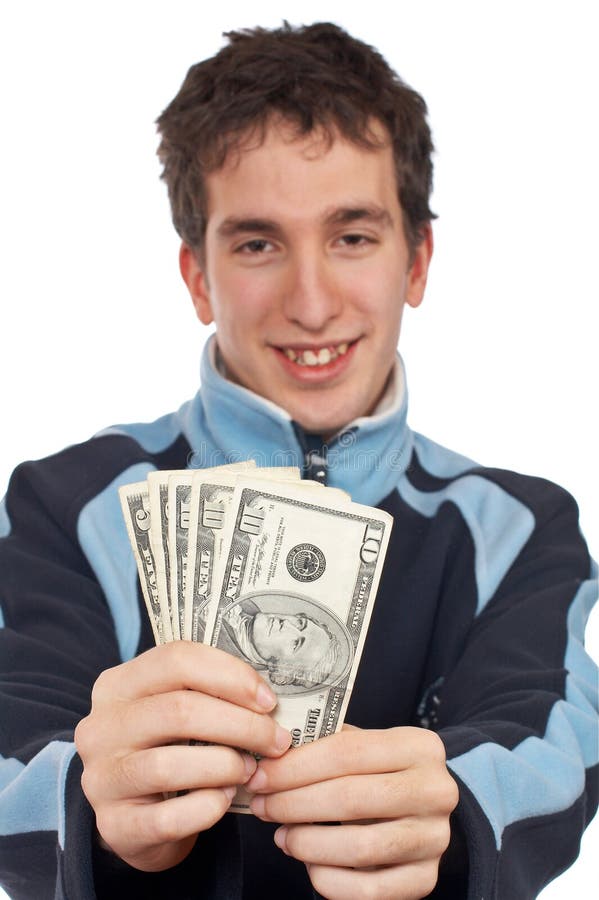 Showing a fan money. Handsome teenager showing a fan money. Focus on money royalty free stock image