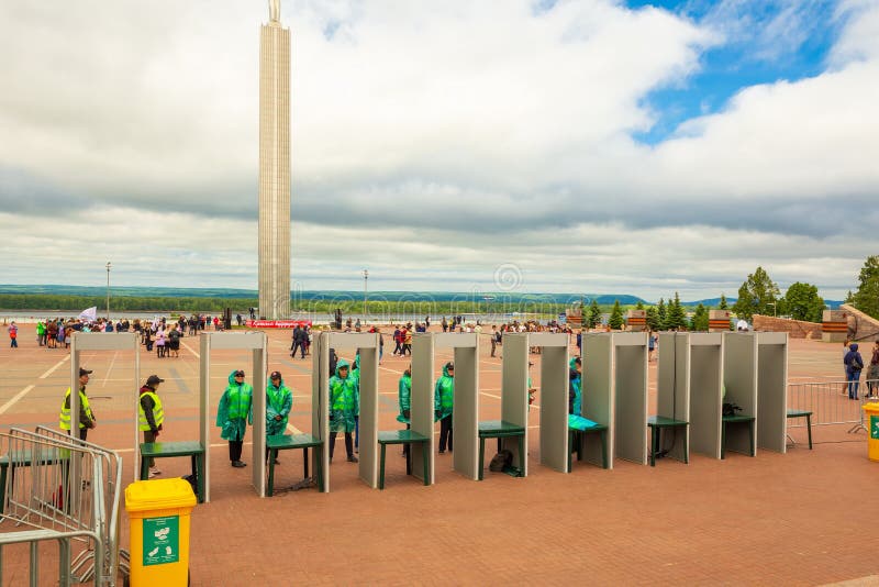 Turnstiles with arched frame metal detectors and security officers. Turnstiles with security officers on the Glory Square in Samara during the last call for royalty free stock photo